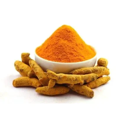 Pansar Essential 100% Pure Organic Turmeric Powder (Haldi) in a bowl with whole turmeric roots for cooking and skin care.